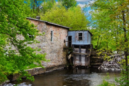 Mill building upon a riverbank