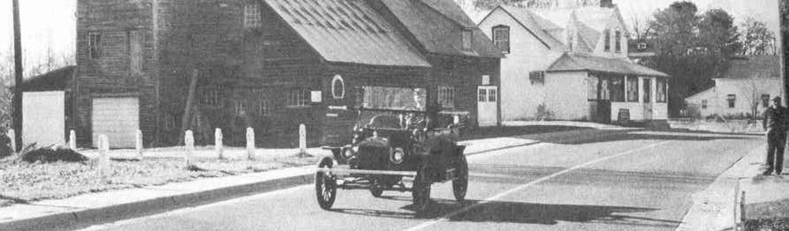 blacksmith shop and car in early 1900s
