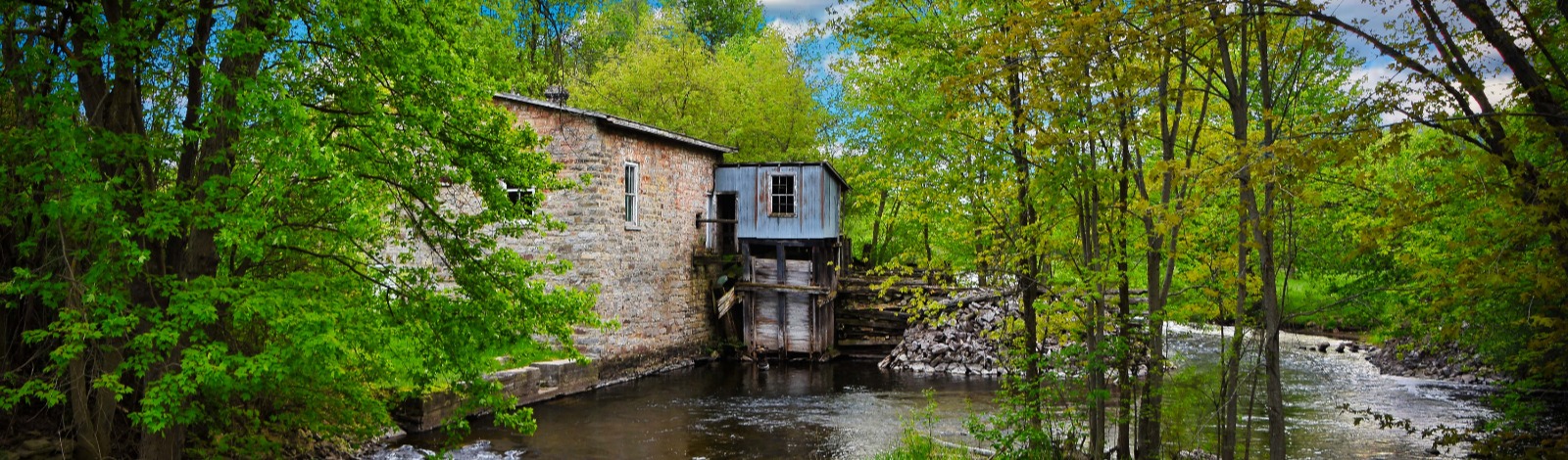 stone building at waters edge