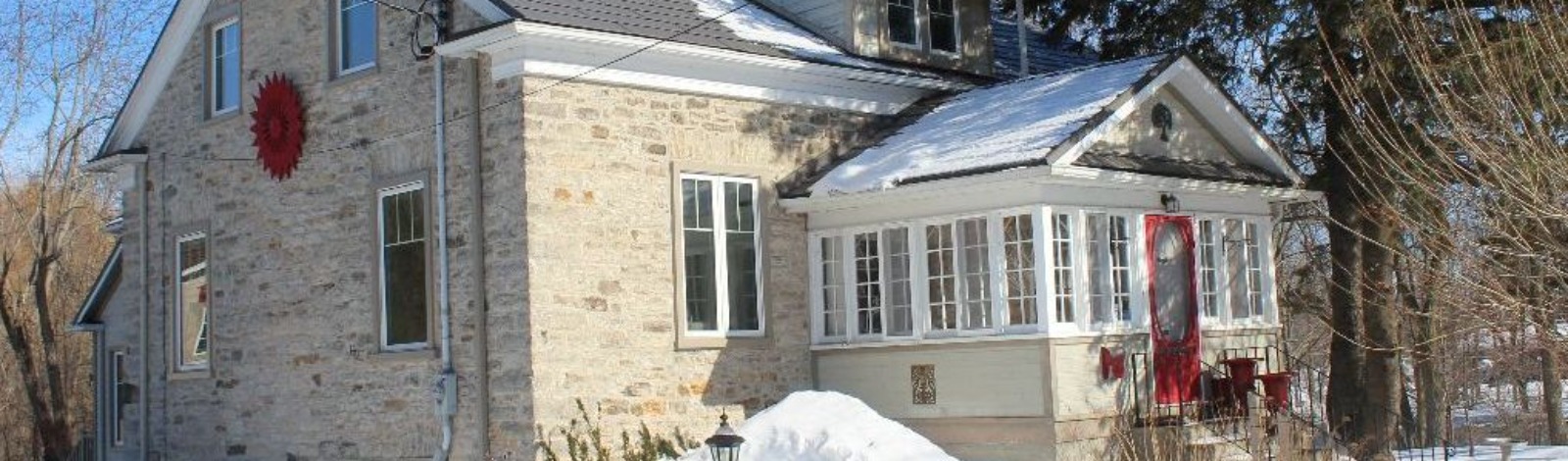 stone house with red door