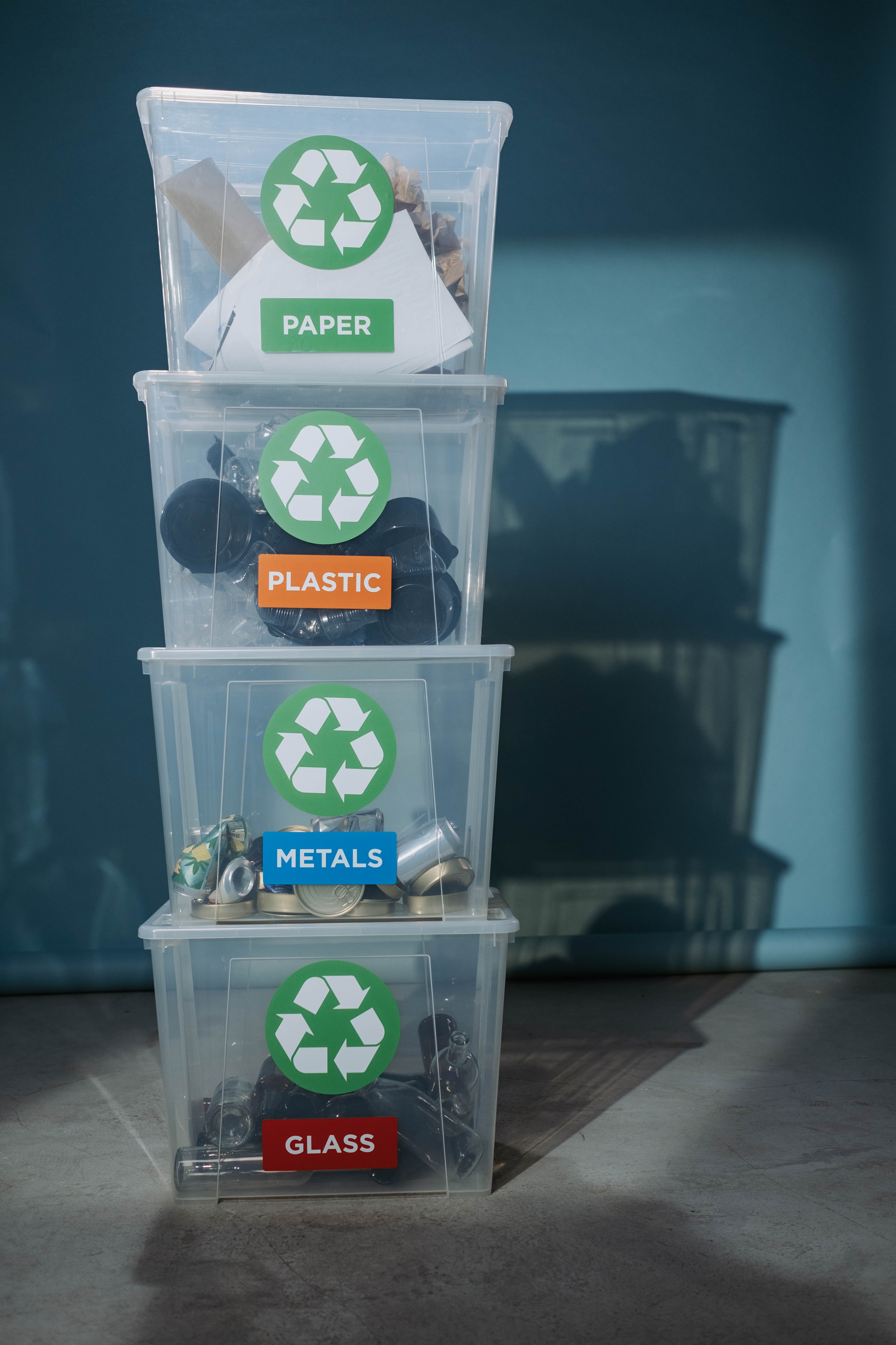 stack of clear recycling boxes