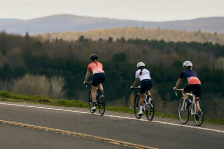 3 woamn cycling on the highway