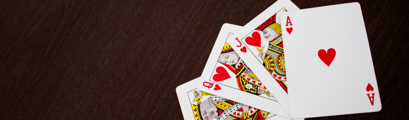 ace, king, queen and jack of hearts cards