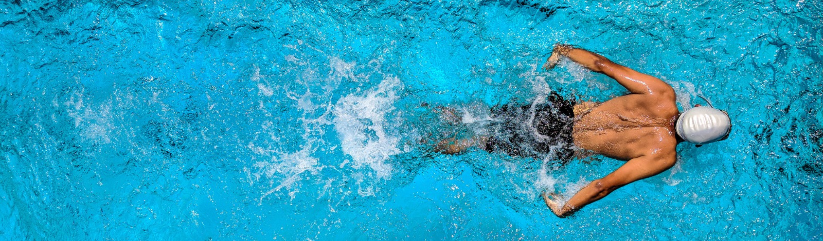 swimmer in indoor pool